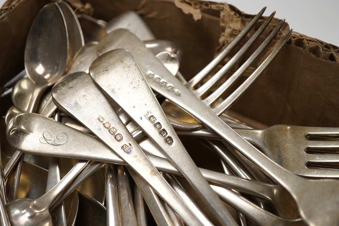 A matched part canteen of 19th century silver Old English and Hanoverian pattern flatware, various dates and makers, 55oz.